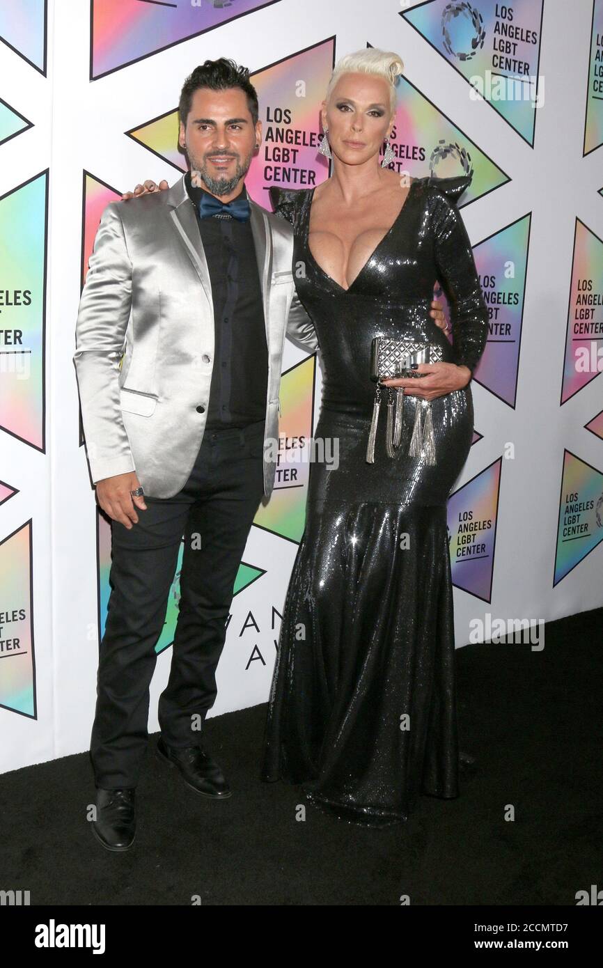 LOS ANGELES - SEP 22:  Mattia Dessi, Brigitte Nielsen at the LA LGBT Center`s 49th Anniversary Gala at the Beverly Hilton Hotel on September 22, 2018 in Beverly Hills, CA Stock Photo
